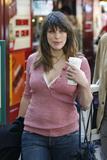 Milla Jovovich in jeans