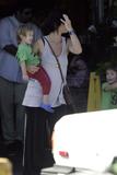 Carrie Anne Moss with hubby and kids