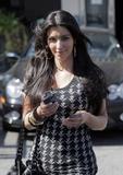 Kim Kardashian show off her big ass in tight pants walking out and about in Beverly Hills