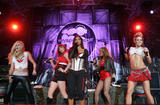 Nicole Scherzinger and the Pussycat Dolls in reveling outfit showing their bodies perform on Operation MySpace live concert in Camp Buehring in Kuwait