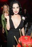 Dita Von Teese shows big cleavage in black dress as she celebrates her birthday at the Fendi 'O' party at Le Milliardaire club on October 4, 2008 in Paris, France